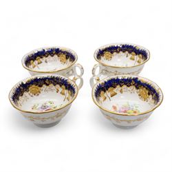 19th century porcelain part tea service, probably Spode, comprising sucrier, milk jug, sandwich plate, seven cups and two saucers, decorated with floral sprays, within cobalt blue and gilt borders, pattern no. 735 