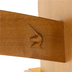 Unicornman - Yorkshire oak rectangular refectory style dining table by Coxwold cabinet maker Geoff Gell, rectangular top above trestle form base with broad scrolling outward outline, and heavy arched stretcher with Unicornman carved motif, traditional mortice and tenon pegged joints between the uprights