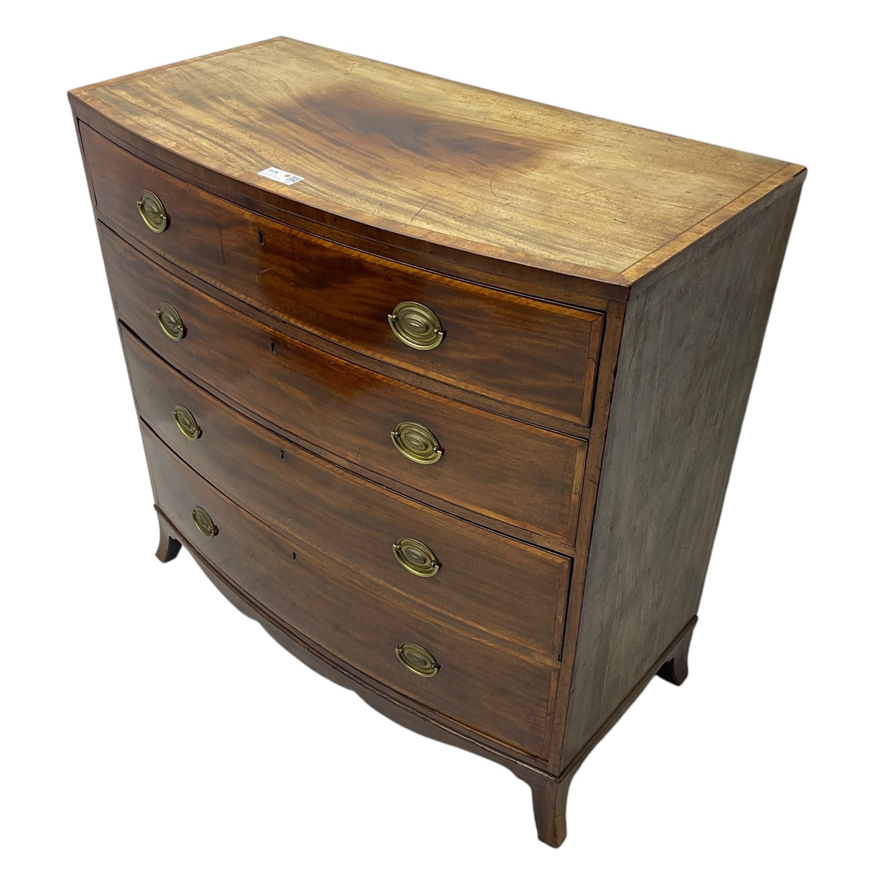 George III mahogany bow-front chest of drawers, four graduated drawers with oval brass handles, raised on splayed bracket feet with a shaped apron