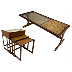 G-Plan rectangular teak coffee table with tiled inset and smoked glass top (121cm x 51cm, H45cm), and a teak nest of tables, the largest with tiled top and drawer