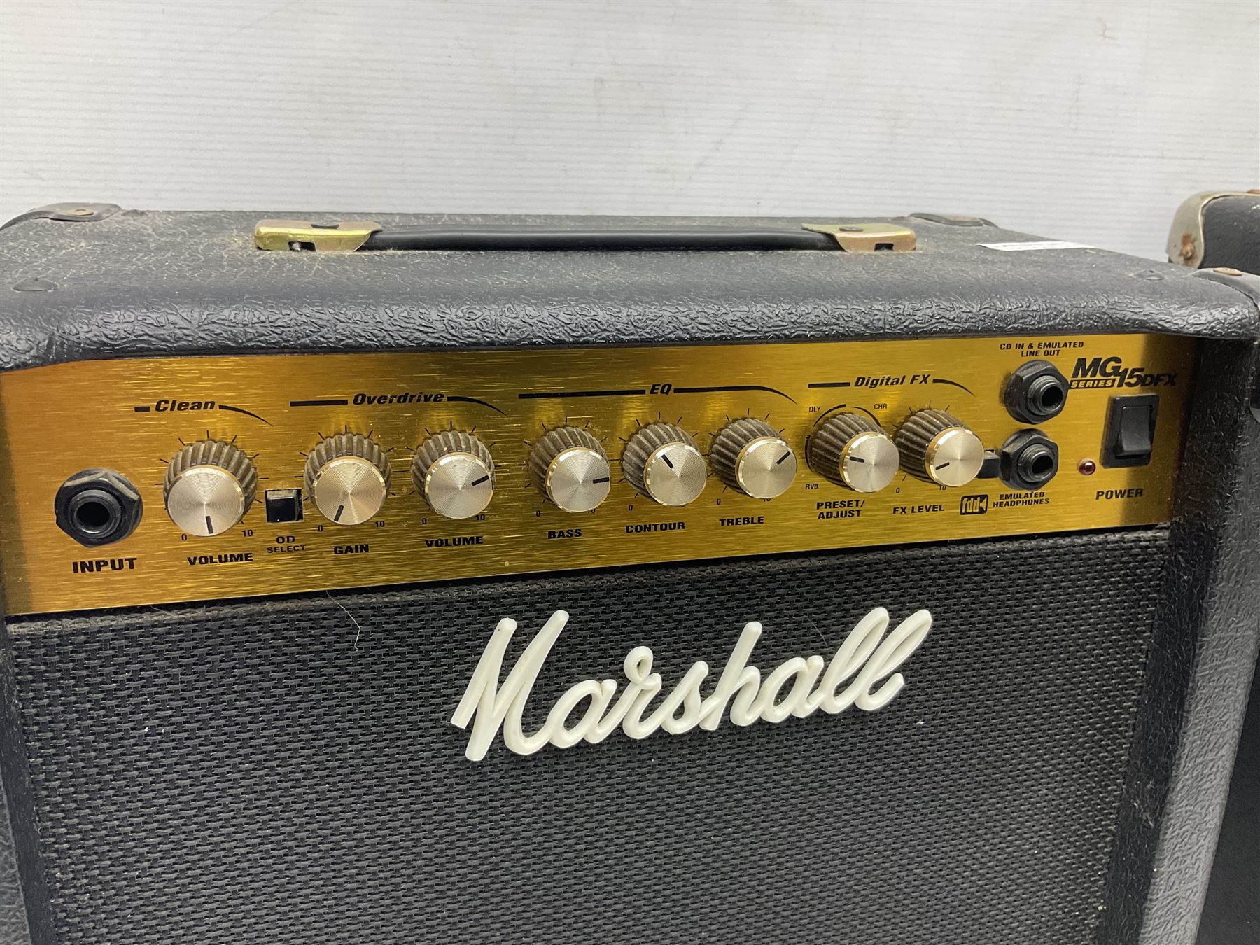 Aria Sinsonido mahogany electric travel guitar, serial no.0502385 L86cm; in original gig bag with earphones and GM11 Minituner; together with Fender Sidekick Reverb 25 amplifier and Marshall MG Series 15DFX amplifier (3)