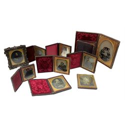 Collection of ten assorted Victorian daguerreotype, ambrotype and tintype portraits, most contained within leather cases with embossed red velvet or red silk lining, largest example with scrolling foliate embossed exterior H15cm when closed W12cm