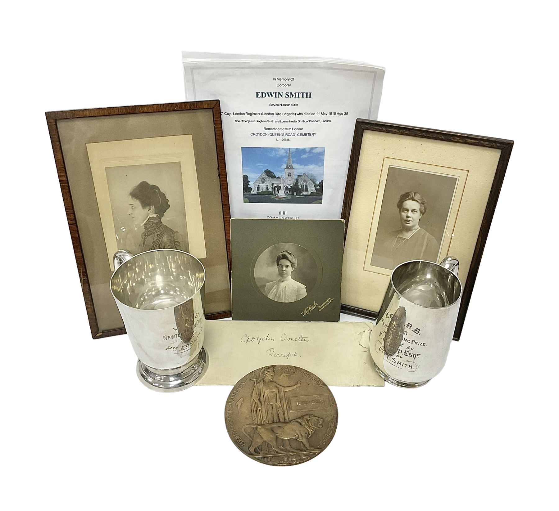 WWI bronze death plaque to Edwin Smith, together with two tankards presented to E.Smith and photographs of his family  