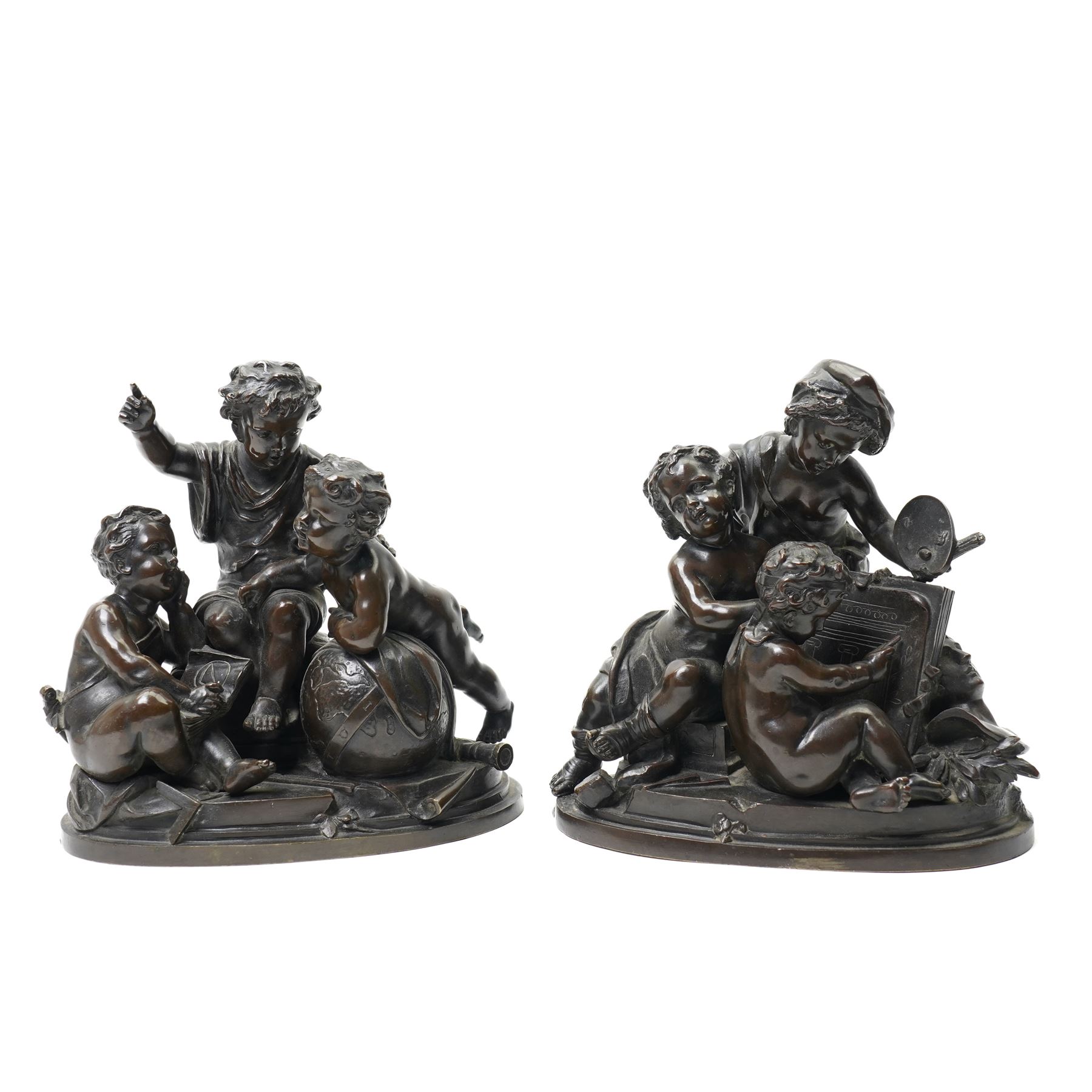 After Louis Valentine Elias Robert (French 1821-1874); pair of 19th century allegorical bronze groups, modelled as putti learning about the arts and sciences, bearing signature to the plinth, H17cm (2)