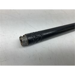 Late 19th/early 20th century Anglo Indian ebony and bone sword stick with 62cm steel blade, brass locking ferrule and lion mask pommel L92 cm.