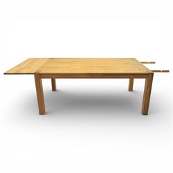 Solid light oak extending dining table with single leaf, and set of six chairs