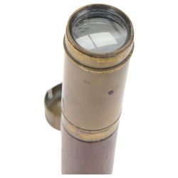 19th century mahogany and brass three drawer telescope, together with a larger leather bound telescope and a large circular metal bound magnifying glass