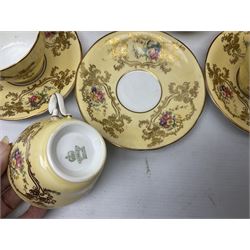 Aynsley tea service for six, decorated with floral sprays in ornate gilt detailing on cream ground, comprising six teacups and saucers, open sucrier and milk jug and cake plate, all with printed marks beneath