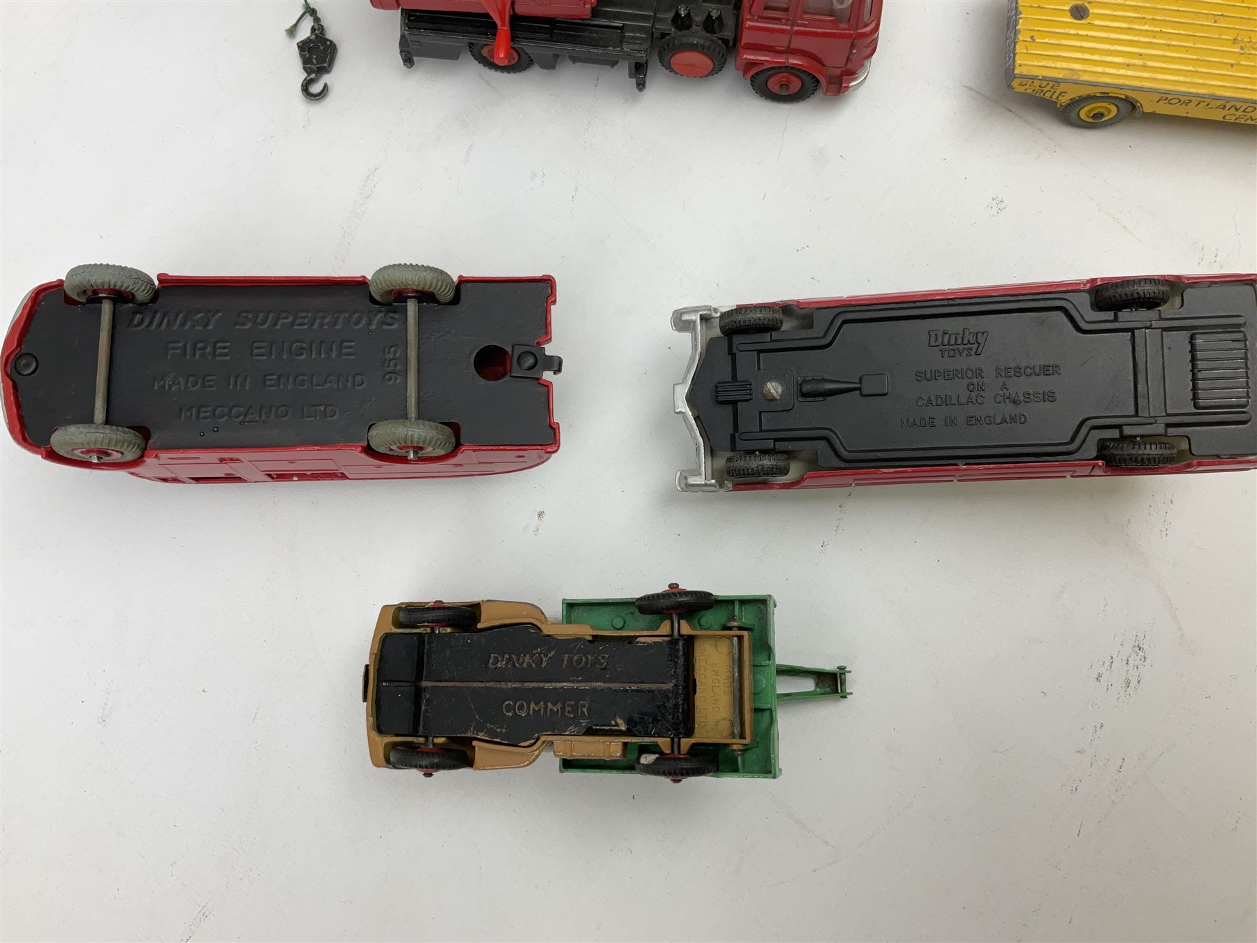 Dinky - eight unboxed and playworn/repainted commercial vehicles including Foden flatbed lorry, Bedford Articulated lorry, Leyland Comet Ferrocrete lorry, Guy Spratts panel van, Fire Engine, Jones Fleetmaster, Commer breakdown truck etc (8)