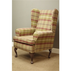  Wing back armchair upholstered in tartan fabric, loose seat cushion on cabriole legs  