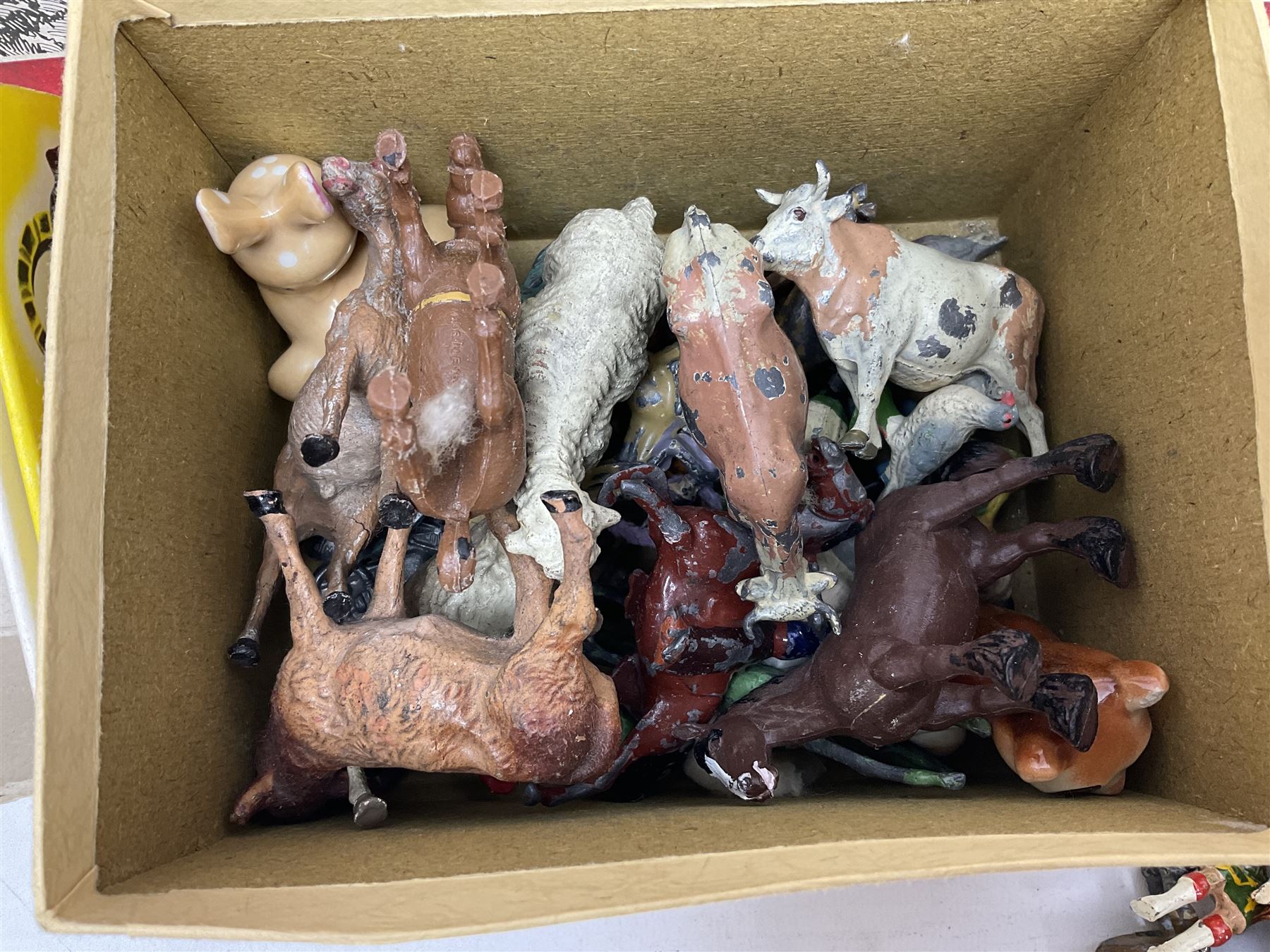 Vintage toys comprising 'Docking RMS Queen Mary' game, two boxed Pelham puppets, quantity of painted metal British soldiers to include Guardsmen, painted farm animal figures