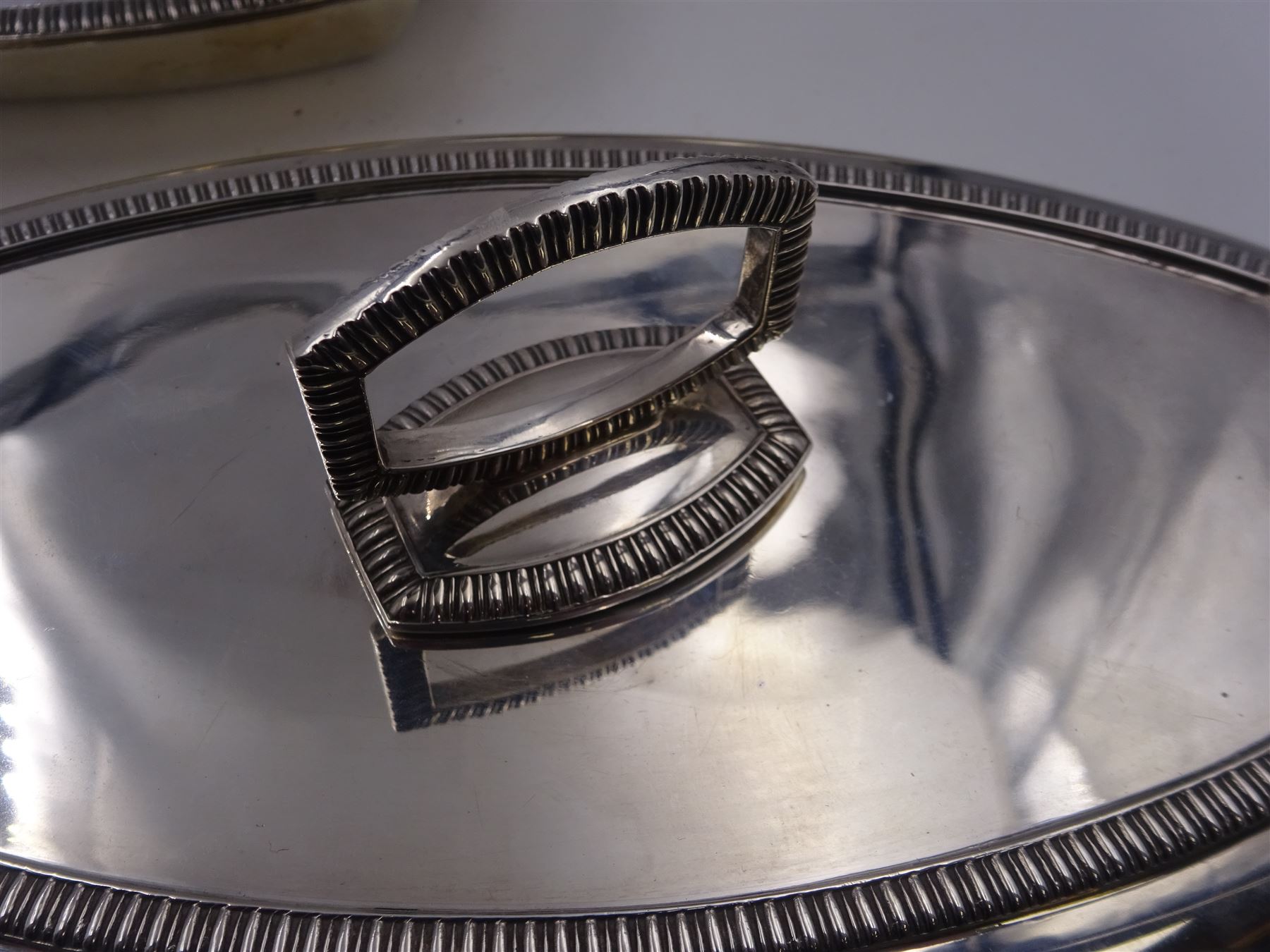 Pair of 1930s silver serving dishes with covers, each with removable handles, hallmarked Barker Brothers Silver Ltd, Birmingham 1935, L27.5cm, H12cm