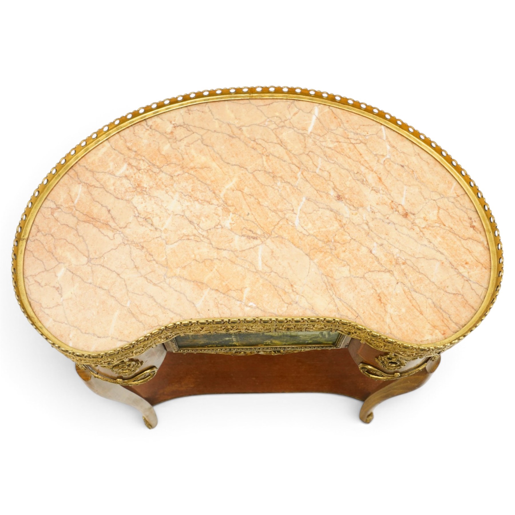 French Louis XV design inlaid kidney-shaped occasional table, the shaped pink marble top with pierced and raised gilt metal gallery edge of egg-and-dart design with swags, fitted with central drawer with a pastoral scene to facia, flanked by gilt metal mounts, raised on cabriole supports united by shaped undertier 
