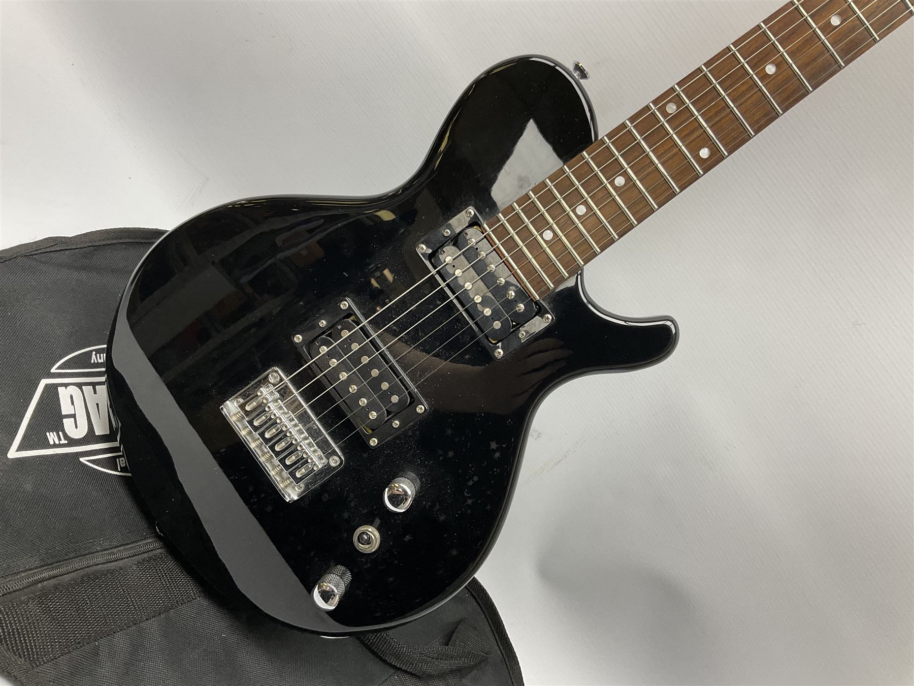 Dean small or child's size electric guitar in black, serial no.O09121956 L85cm; in gig bag; and modern student's violin with 35.5cm two-piece back in fitted carrying case with older bow (2)