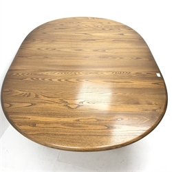 Ercol elm Old Colonial extending pedestal dining table with single leaf (W115cm and 165cm, H73cm, D115cm) and set six hoop back dining chairs (W43cm) 