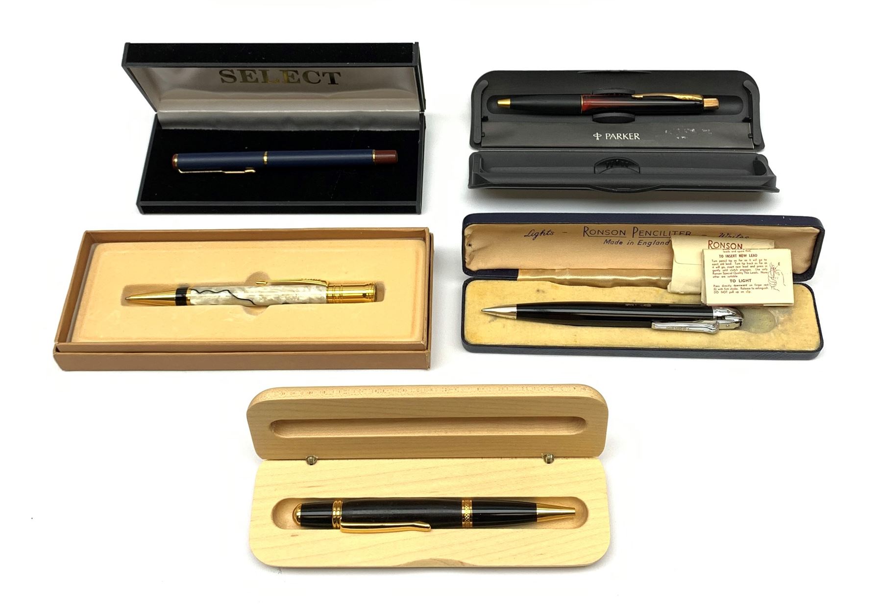 A group of pens, comprising Parker Duofold Centennial pearl and black ballpoint pen, Parker Frontier ballpoint pen, Ronson Penciliter, in original box, Parker Rialto fountain pen, and a further unmarked ballpoint. (5). 