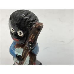 Robinson Jam plaster Golly band, including drummer and singer, H7.5cm

Originally handmade by mothers in Africa for their children from old fabric and cloth, the golly doll was adopted as the mascot and trademark for the Robertson's confectionery brand around 1910 after the company's founder John Robertson visited the US and noticed children playing with them. Robertson's Gollies have been collected by people across the UK and around the world for generations but garnered a contentious image in the 1980s because of links to racism. The trademark was removed from Robertson's branding in 2001.