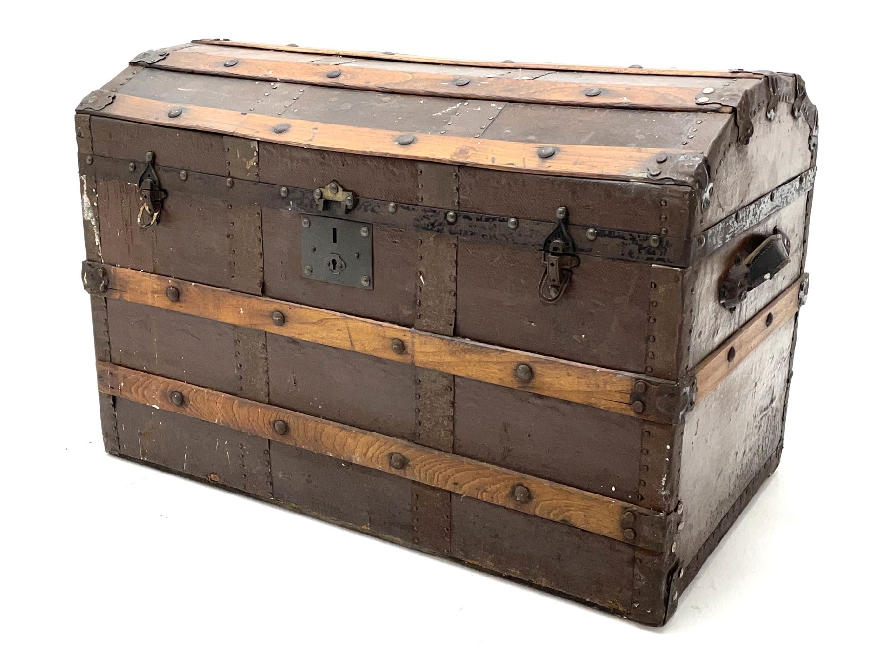 Early 20th century wood and metal bound trunk with dome hinged top