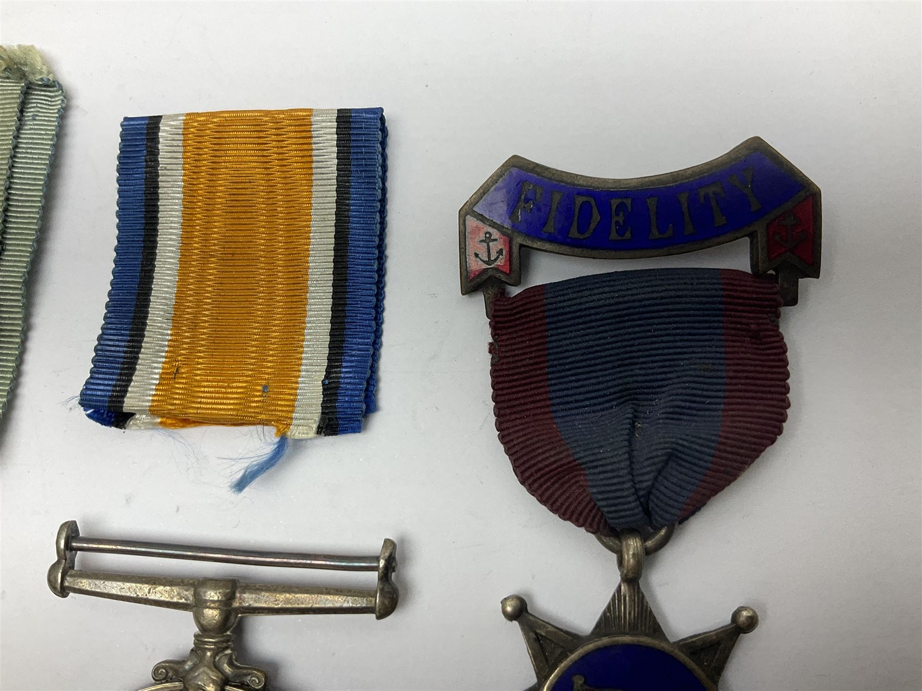 WW1 British War Medal awarded to 28885 Pte. A. Hey R. War. R.; WWI Victory Medal awarded to 7633 Pte. E. Edwards L'Pool R.; two WWII medals; Royal Navy Temperance Society Medal; Services Rendered badge No.B55177; and Home Guard lapel badge