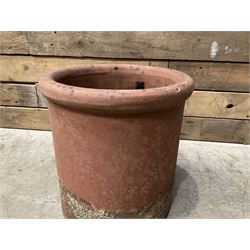 Cast iron cauldron set pot with 2 terracotta chimney pots and 2 terracotta planters,