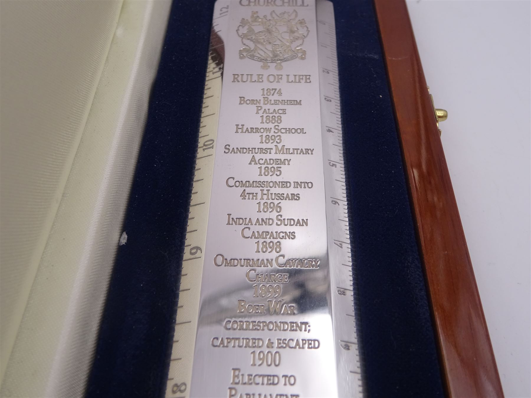 Modern silver 'Churchill Rule of Life' ruler, by Richard Jarvis of Pall Mall, engraved with the significant events and dates of Winston Churchill's life, from his birth in 1874 to his funeral in 1965, hallmarked Richard Jarvis, London 2007, L33.5cm, within wooden fitted case, with applied portrait to cover and silk and velvet lined interior
