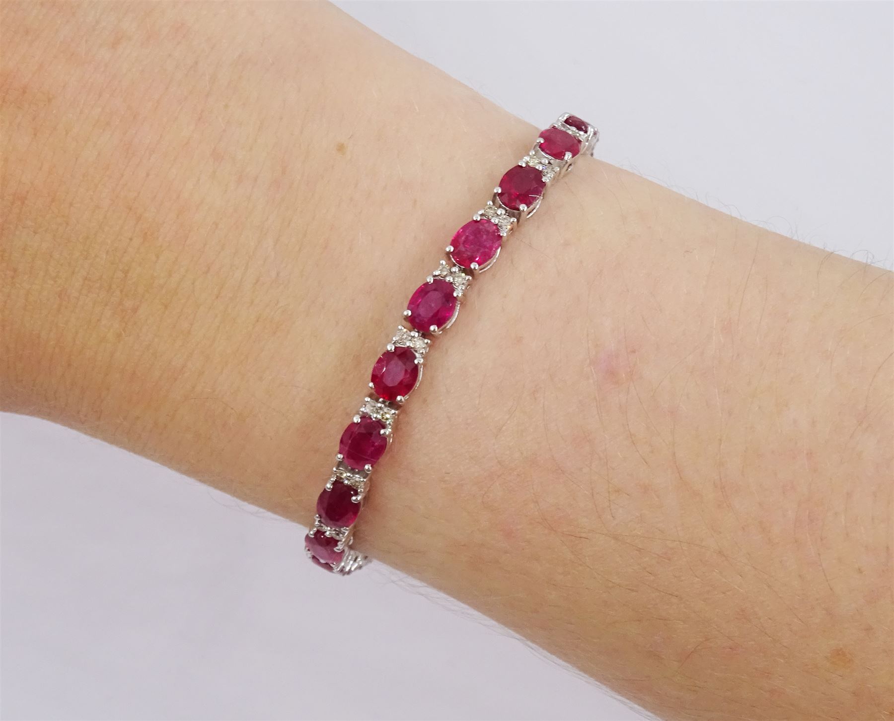 18ct white gold oval ruby and round brilliant cut diamond bracelet, stamped, total ruby weight approx 9.65 carat