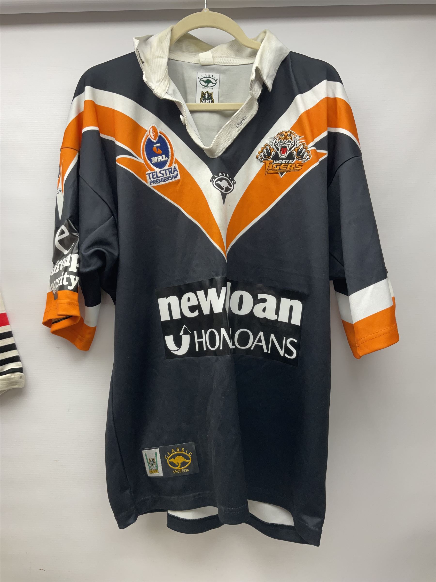 Three Australian Rugby League shirts, to include NRL West Tigers shirt, NSW RL North Sydney Bears shirt and an Australian International rugby shirt, with applied W.Simpson name to front
