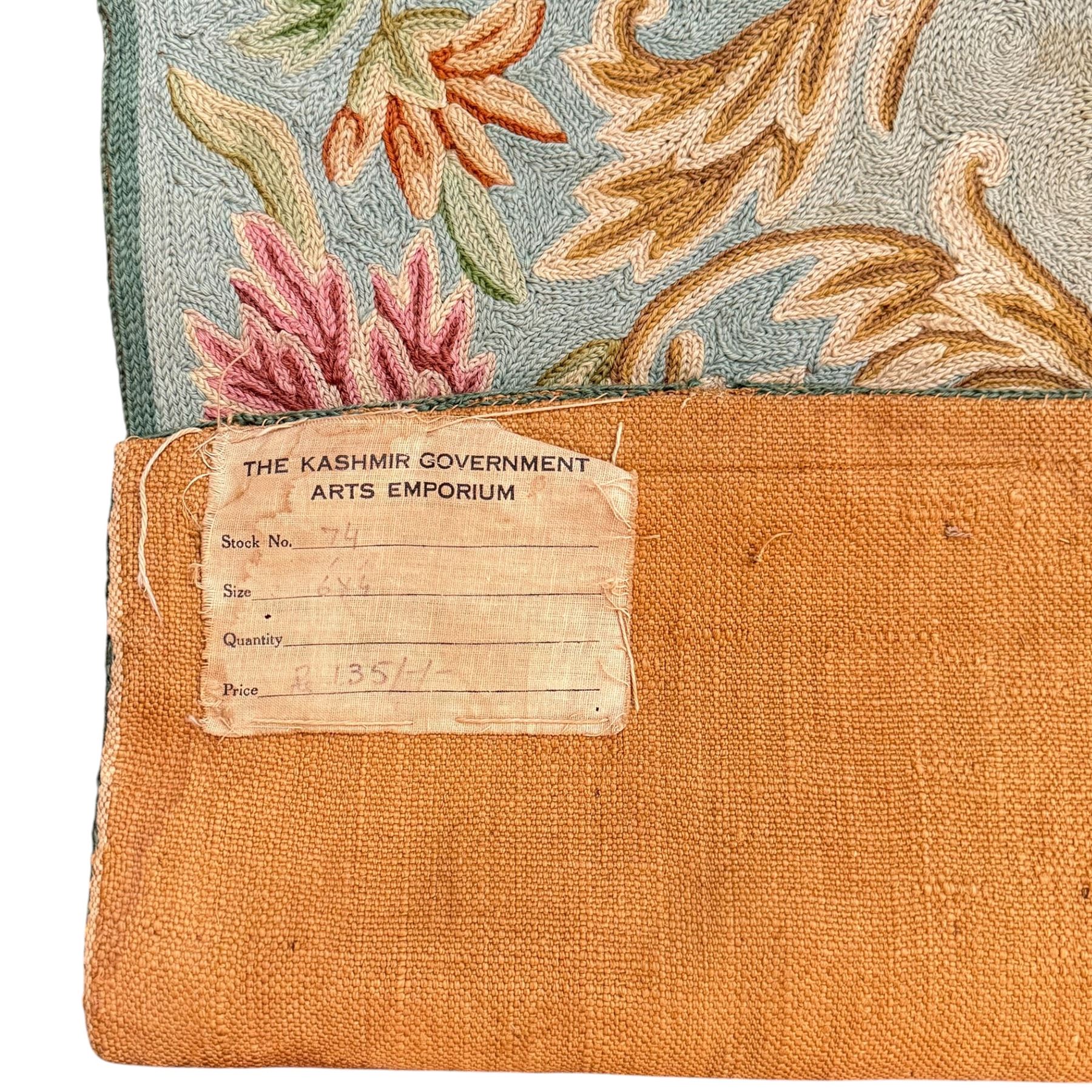 Two early 20th century Kashmiri cyan ground crewelworks 