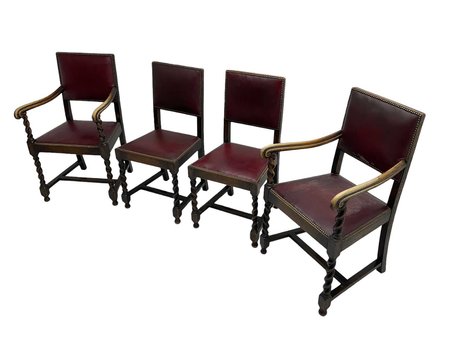 Set four early 20th century oak barley twist dining chairs, upholstered in burgundy leather with stud work, two carvers and two side chairs