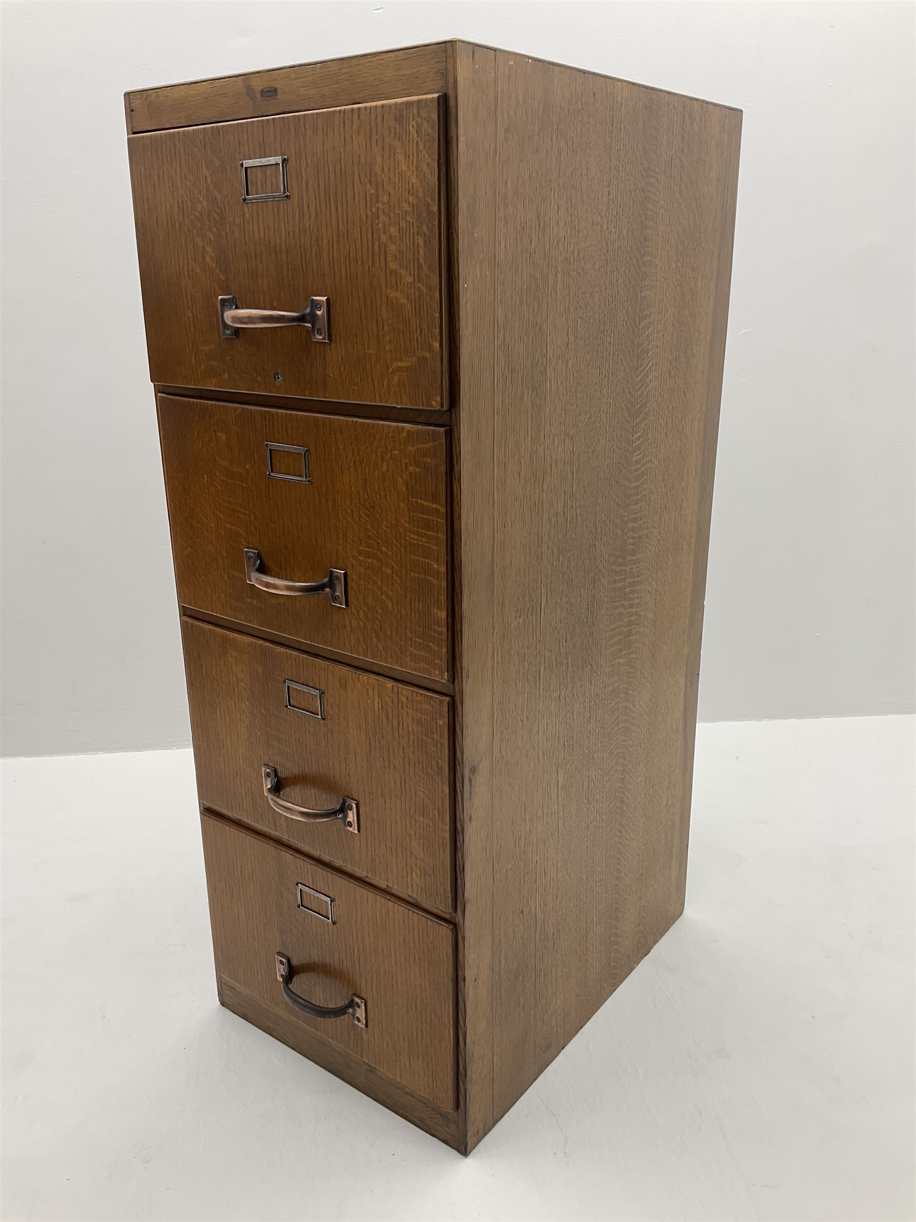 Vintage oak filing cabinet, fitted with four deep drawers 