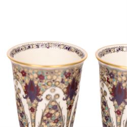 Pair of early 20th century Royal Worcester shape 2601 vases, painted with peacock feather design, marked in puce to base H16.5cm 