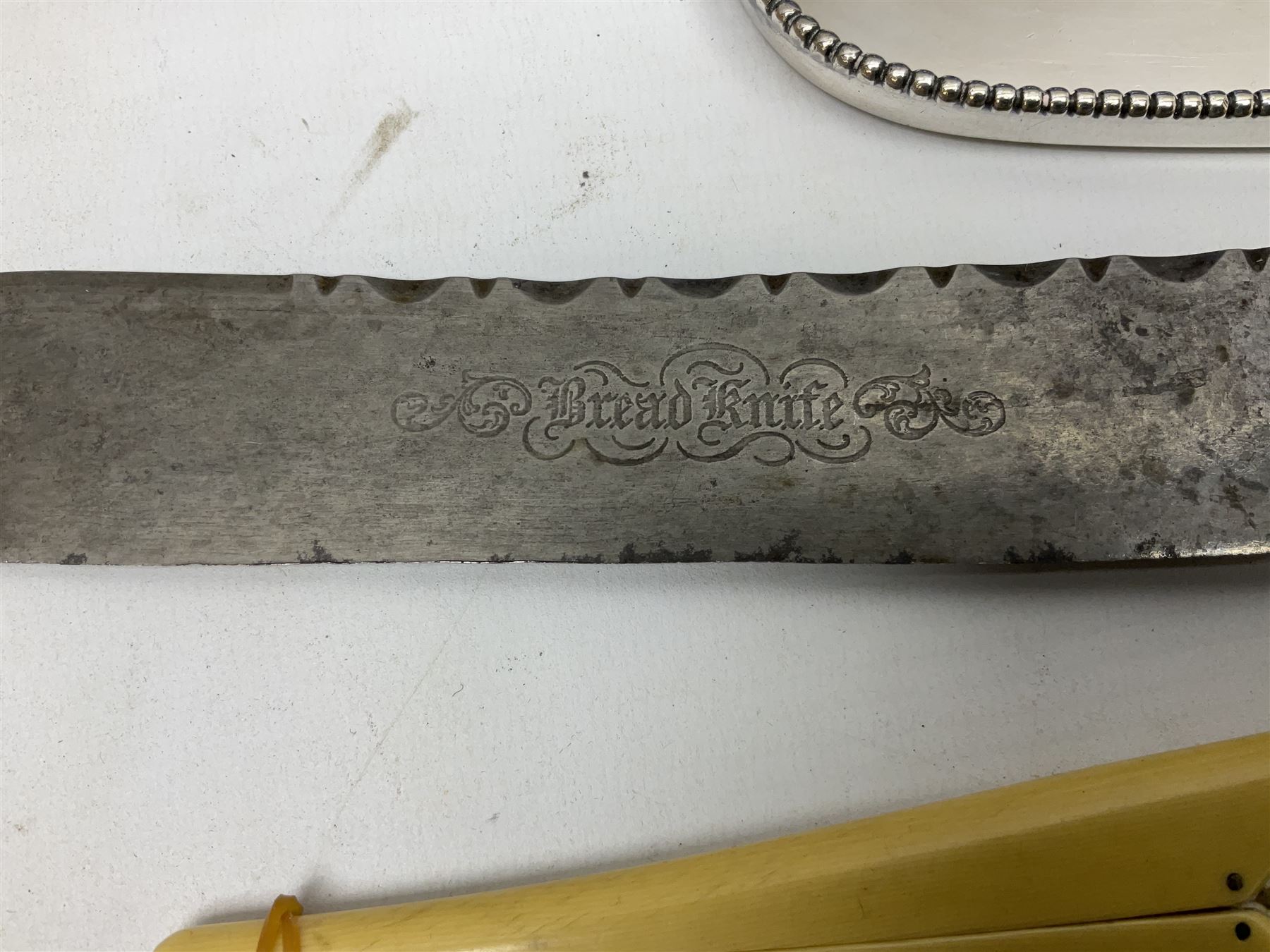 Cased pair of Wedgwood silver-plate book stands, silver-plate baby feeding spoon and pusher in box, other silver-plated cutlery