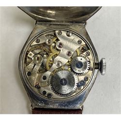 Early 20th century Rolex manual wind stainless steel wristwatch, gilt dial with Arabic numerals and a Rolco manual wind silver wristwatch, London import mark 1931