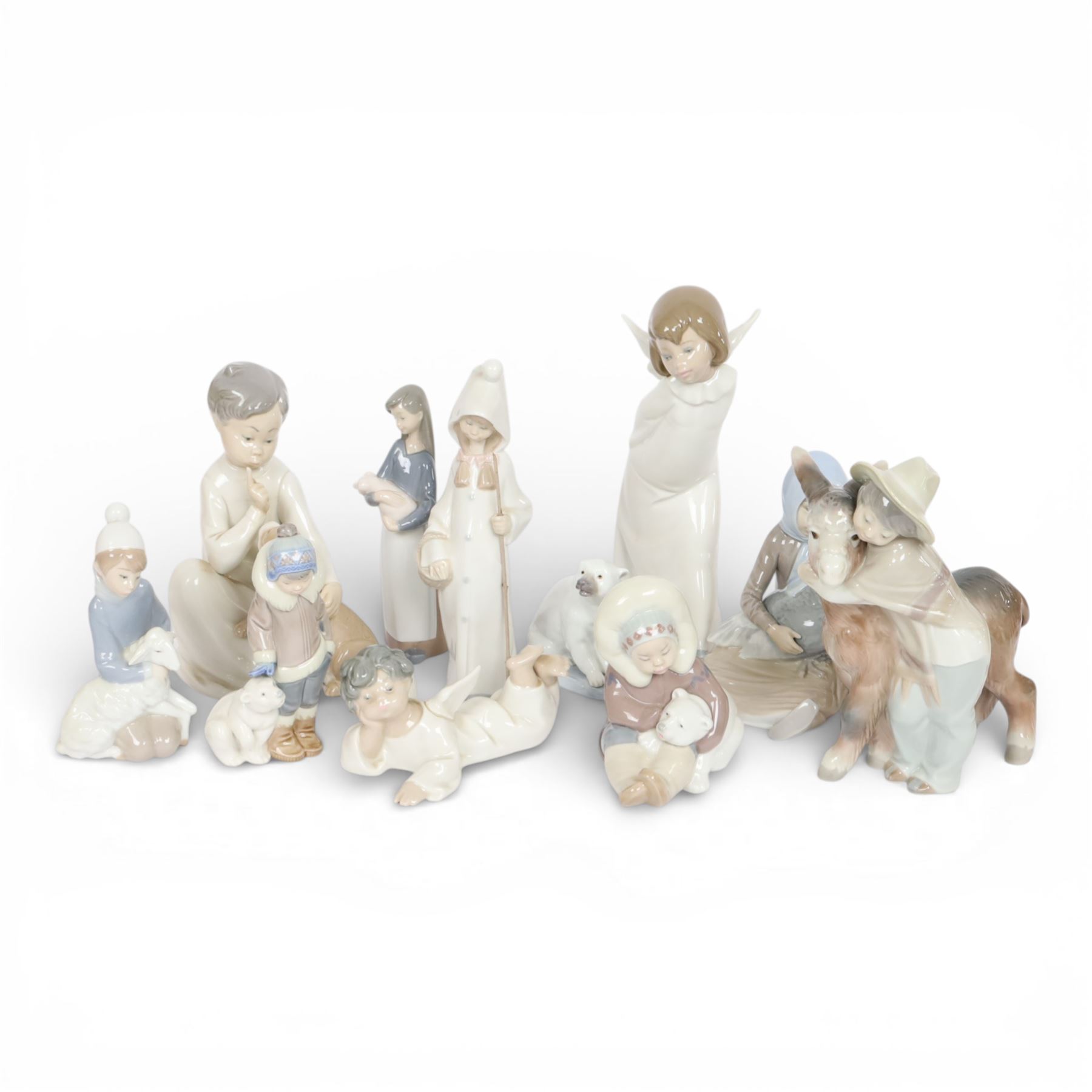 Collection of Lladro including Girl with Turkey 4569, Platero and Marcelino 1181, Eskimo Boy 5238 etc 