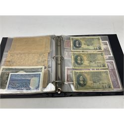 World banknotes, including Queen Elizabeth II The States of Jersey one pound 'DB202703', five pounds 'BB527762' and ten pounds 'AB651481', reserve bank of New Zealand two dollars '1L3 741894', King George V Straits Settlements one dollar 1st January 1935 'F/83 28924', various Bank of England notes etc, housed in two ring binder albums