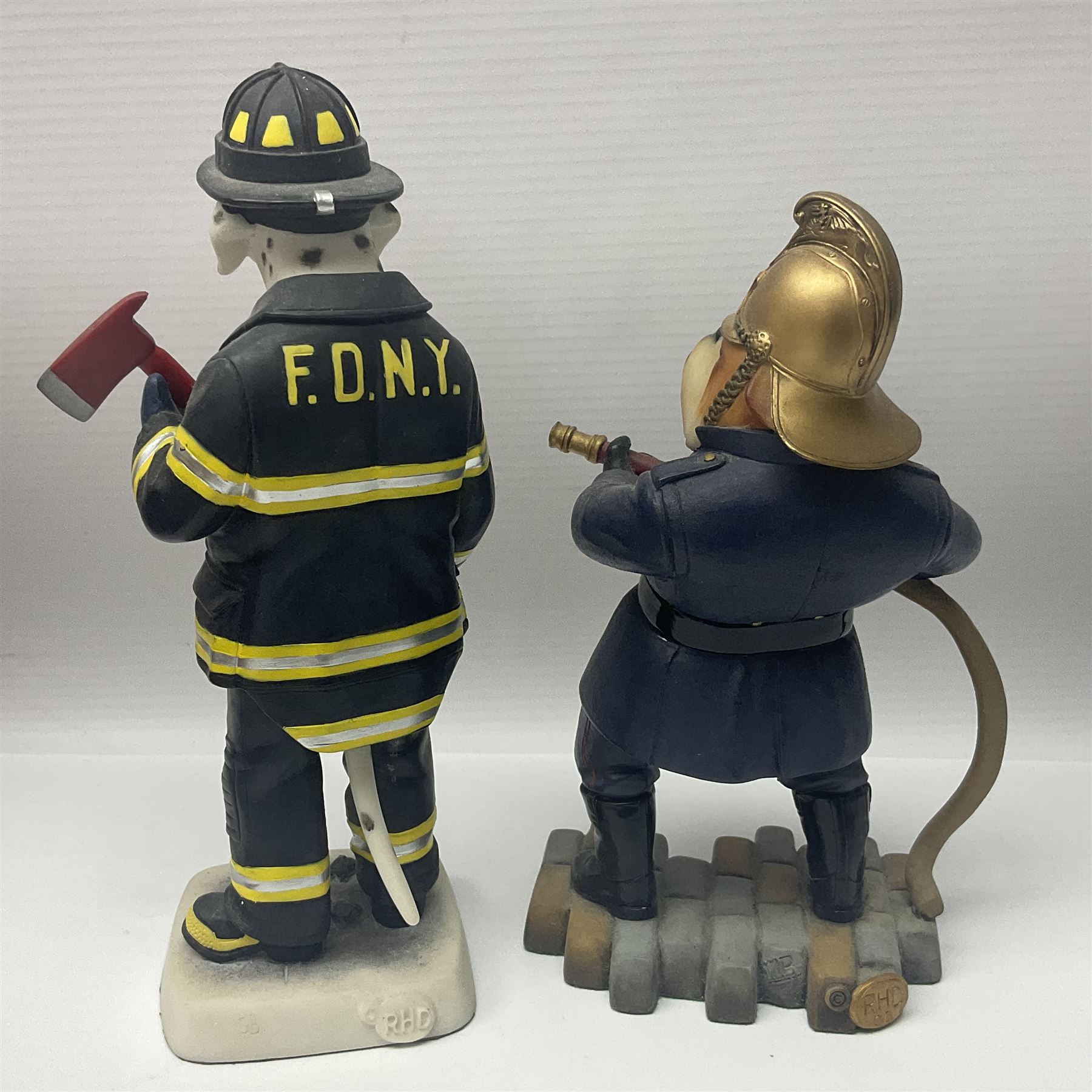 Eleven Robert Harrop figures from various collections, comprising limited edition The Trumpton Fire Engine Musical Box CGMB8 no. 359/1000, The Dragon from the Red Knight BN09, Bulldog Fireman DP165, Pointer Fire Chief DP184, Dalmatian New York Fire Fighter DP234, Dalmatian Fire Fighter DP191; Desperate Dan ‘Fireman Dan’ BDS11, Cuthbert CG13, Pugh (Clarinet) CG70, The Soup Dragon CL05 and Baby Dragon CL06