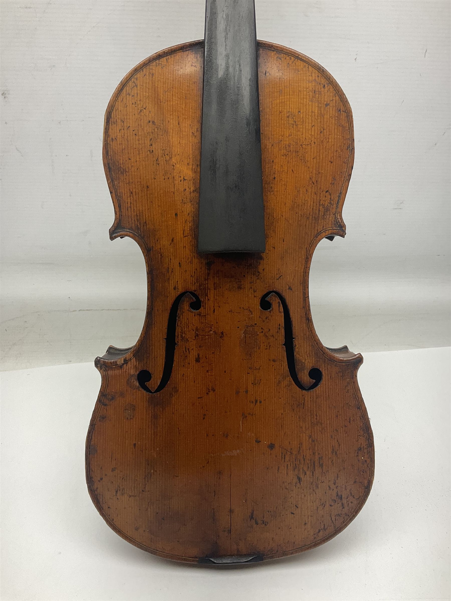 Late 19th century German trade violin c1890 with 36cm two-piece birds-eye maple back, neck and ribs and spruce top; bears label 'Manufactured in Berlin Special Copy of Nicolaus Amati' L59.5cm; in carrying case