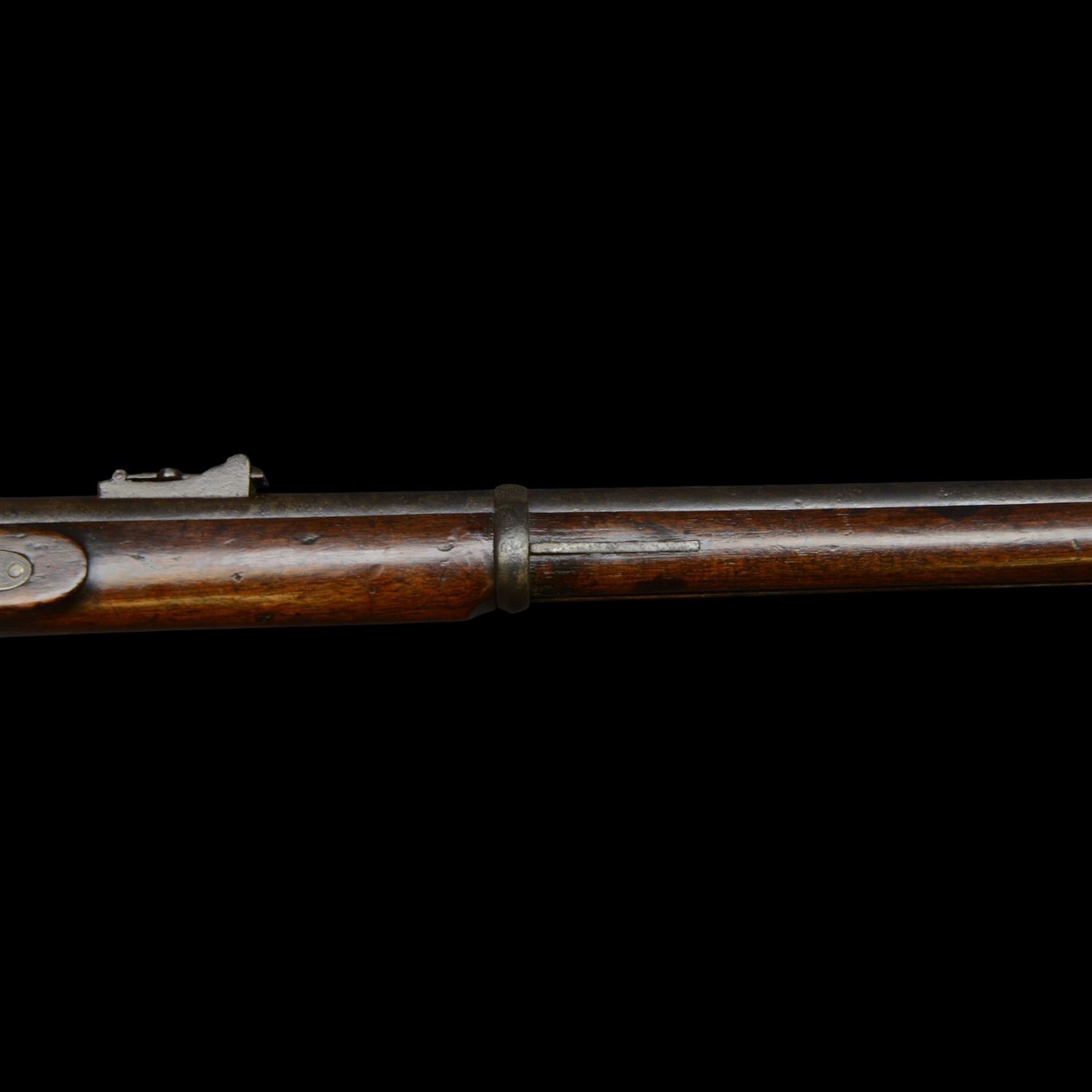 19th century Enfield percussion rifle, the 99cm barrel with three barrel bands, fore sight and rear sight, ramrod under, full walnut stock with brass butt, carrying sling brackets, action marked '1855 Tower' with Victoria cypher, overall L138cm