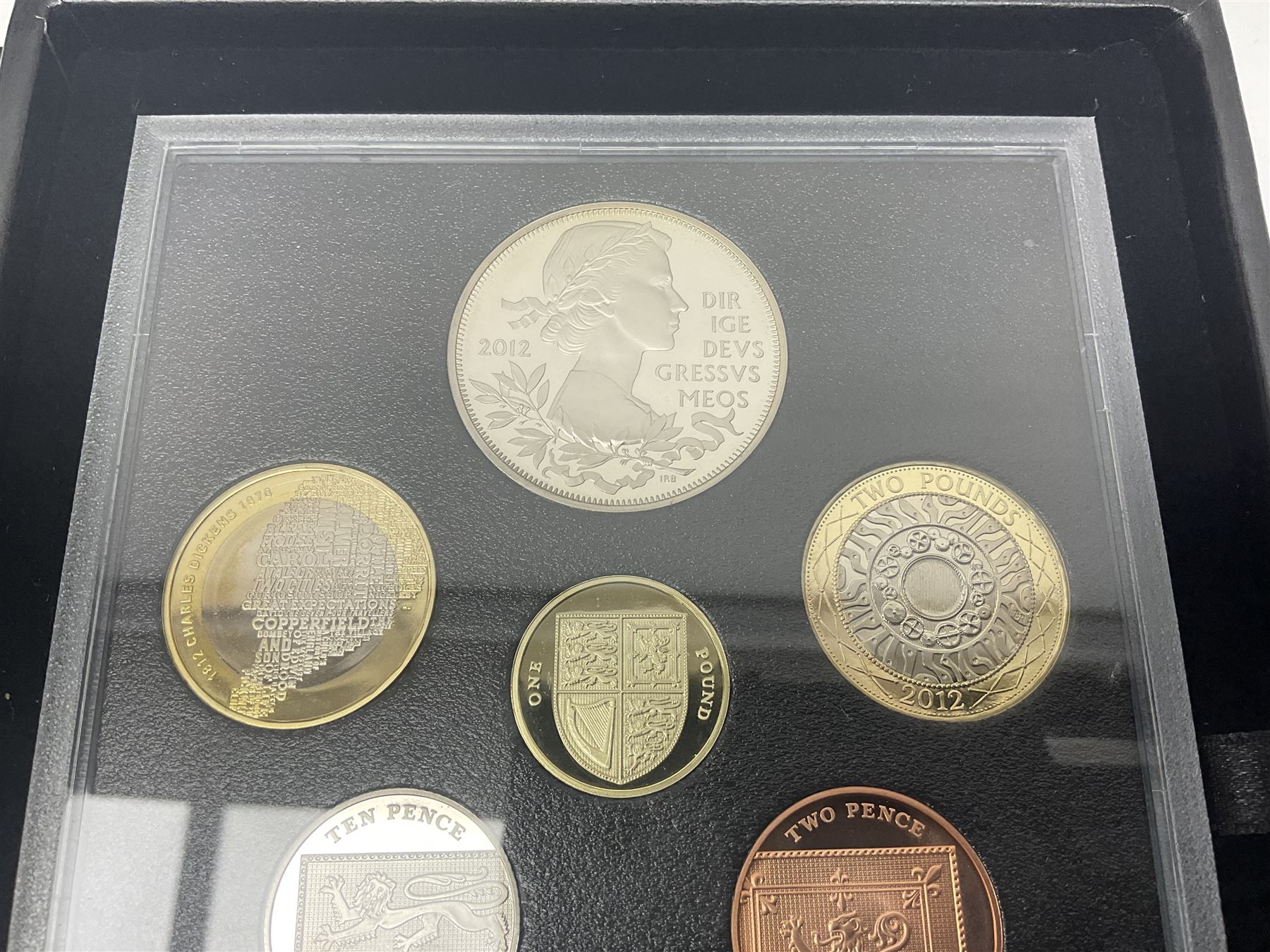 Mostly commemorative coinage, including various Queen Elizabeth II United Kingdom brilliant uncirculated fifty pence, two pound and five pound coins in card folders, The Royal Mint United Kingdom 2012 proof coin set, Alderney 2021 'Royal National Lifeboat Institution' five pound coin cover in Harrington and Byrne folder etc