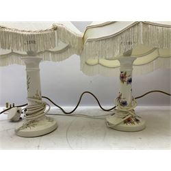 A Belcari figural table lamp, modelled as a young gent leaning upon brick wall, on turned wood base, signed, H70cm incl shade, together with bronzed figural table lamp of a lady with parasol upon ornate circular plinth base, two ceramic table lamps and another lamp (5)