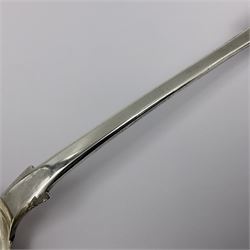 Victorian Newcastle silver Fiddle Shell pattern serving spoon, the terminal engraved with crest of a fist holding an arrow aloft, hallmarked Lister & Sons, Newcastle 1862, L31cm