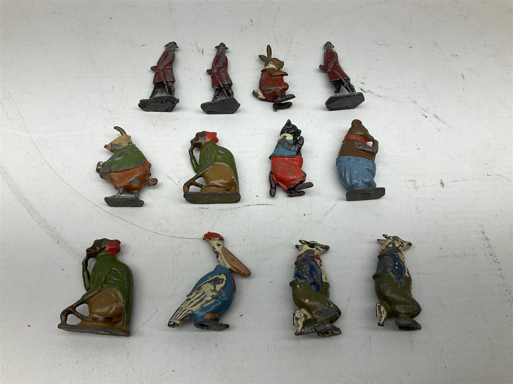 Collection of twenty-two Britains Cadbury's Cococubs play worn lead painted figures to include Mr Pie Porker, Mrs Pie Porker, Tiny Tusks, Captain Kangaroo, Granny Owl and others, Britains Snow White and Doc lead figures and other painted lead figures (30)