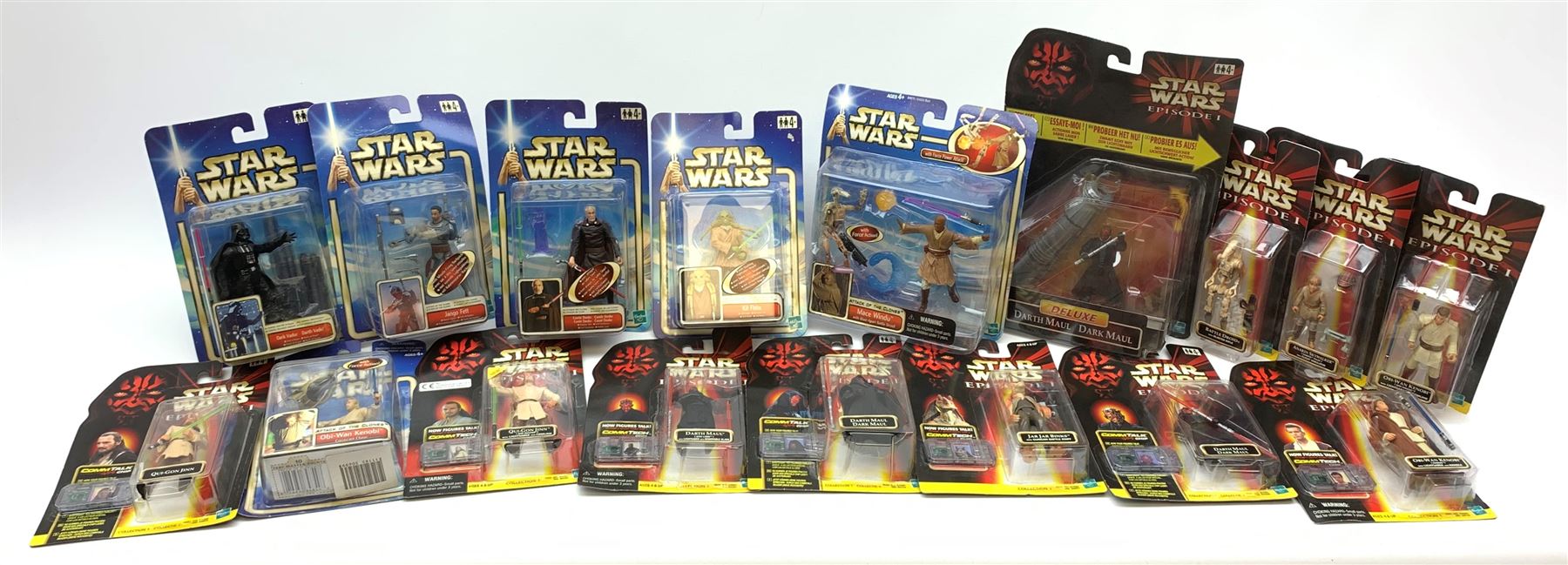Star Wars - Episode 1 eleven Hasbro action figures, ten with CommTech chip, including two x Obi-Wan Kenobi, Battle Droid, Anakin Skywalker, four x Darth Maul (one Deluxe), Jar Jar Binks and two x Qui-Gon Jinn; together with five Attack of the Clones figures including Obi-Wan Kenobi, Count Dooku, Kit Fisto, Jango Fett and Mace Windu; and an Empire Strikes Back figure of Darth Vader; all in unopened blister packs (17)