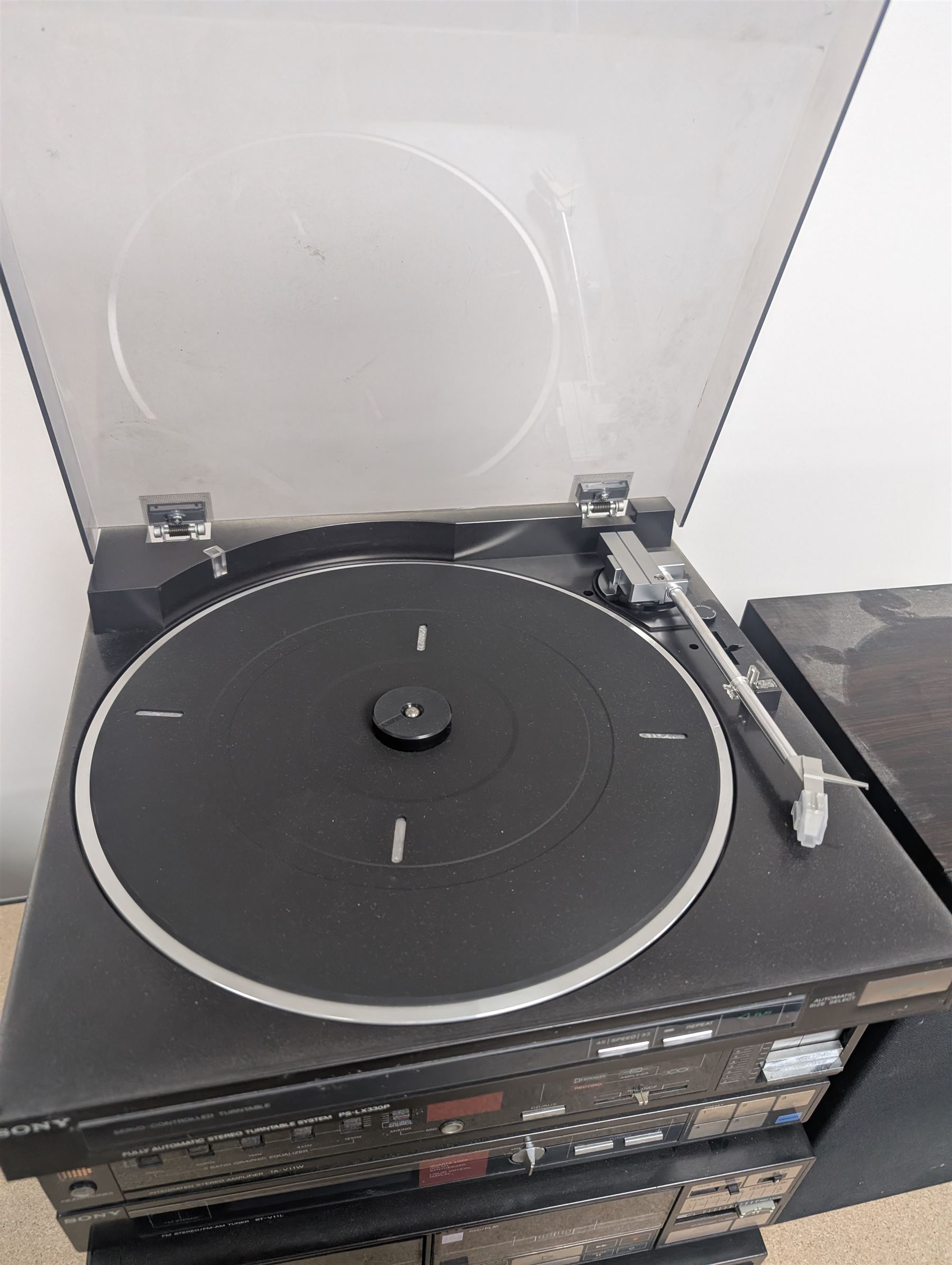 Sony HiFi system, comprising PS-LX330P Turntable, CDP-30 CD Player, TA-V11W Amplifier, ST-V11L FM-AM Tuner, TC-V11W Cassette Player and a pair of SS-V11 16cm 2Way Woofer Speakers