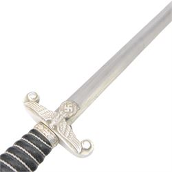 WWII German Third Reich Land Customs Officers dagger, the L30cm double edged blade stamped to the ricasso  Eickhorn Solingen, wire bound leather grip with laurel pommel, eagle and swastika crossguard, in leather scabbard with white metal mounts, overall L41cm