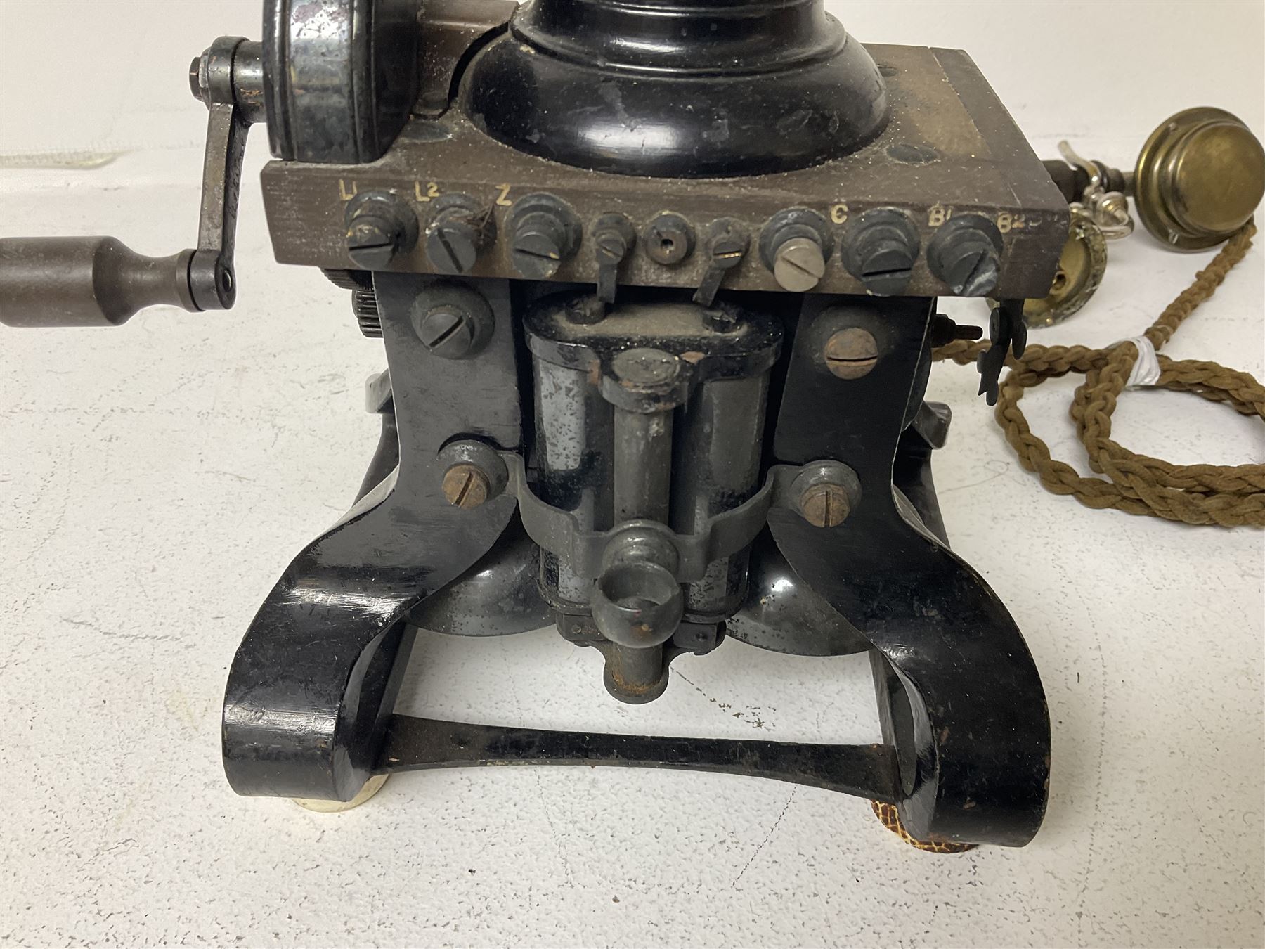 Early 20th century Skeleton Type telephone, probably made by Ericsson, marked MR No. 16, with headset, H30cm