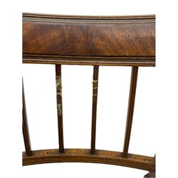 Three 19th century mahogany elbow chairs - including one late Regency example with figured cresting rail over sweeping moulded arms, on turned and reeded supports 