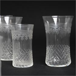 Suite of early 20th century cut and etched table glass comprising nine tumblers, ten smaller tumblers, eleven small wine glasses, six sherry glasses and water jug together with four other sherry glasses