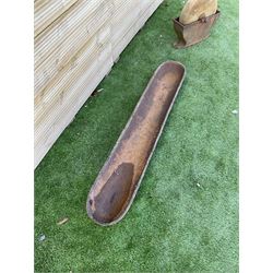 Small stone sharpening wheel, and a shallow cast iron trough - THIS LOT IS TO BE COLLECTED BY APPOINTMENT FROM DUGGLEBY STORAGE, GREAT HILL, EASTFIELD, SCARBOROUGH, YO11 3TX