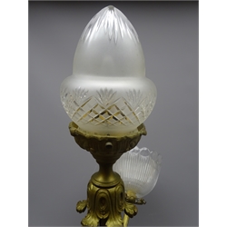  Early 20th century gilt metal four light electrolier, the pressed glass shades issuing on scrolling foliate cast arms above a cut glass acorn shaped glass shade, H74cm x W57cm approx  